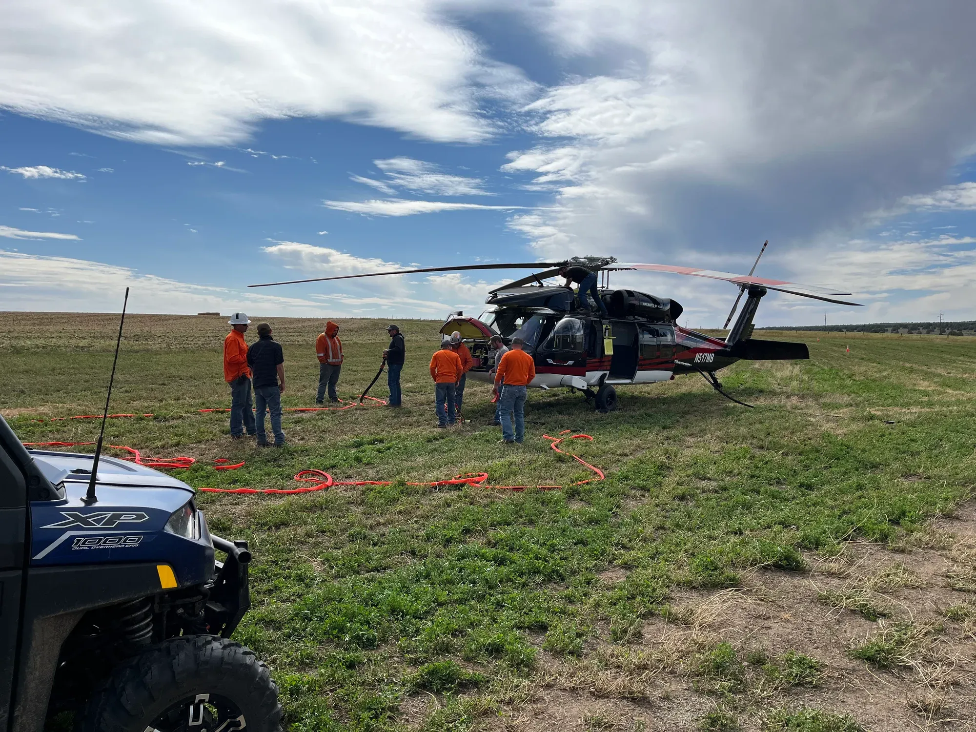 Crew Rigging the Load